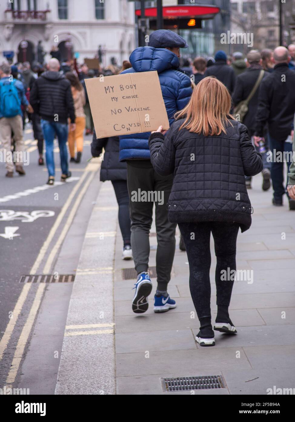 London, 20th March, 2021. Girl protesting at the Anti-lockdown protests in London, UK. Credit: Kevin Seivwright/Alamy Live News. Stock Photo