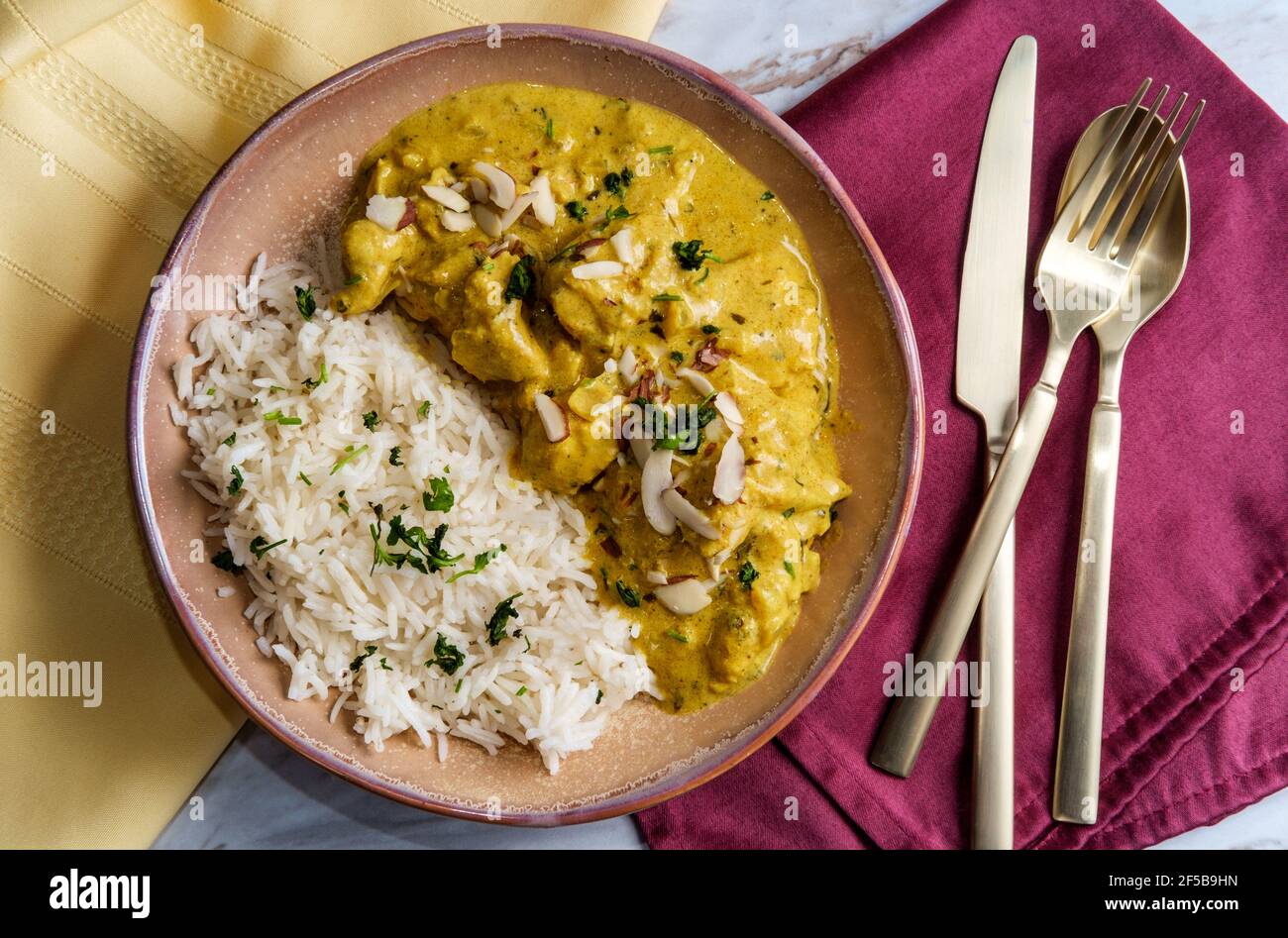 Authentic Indian chicken korma curry with jasmine rice Stock Photo Alamy