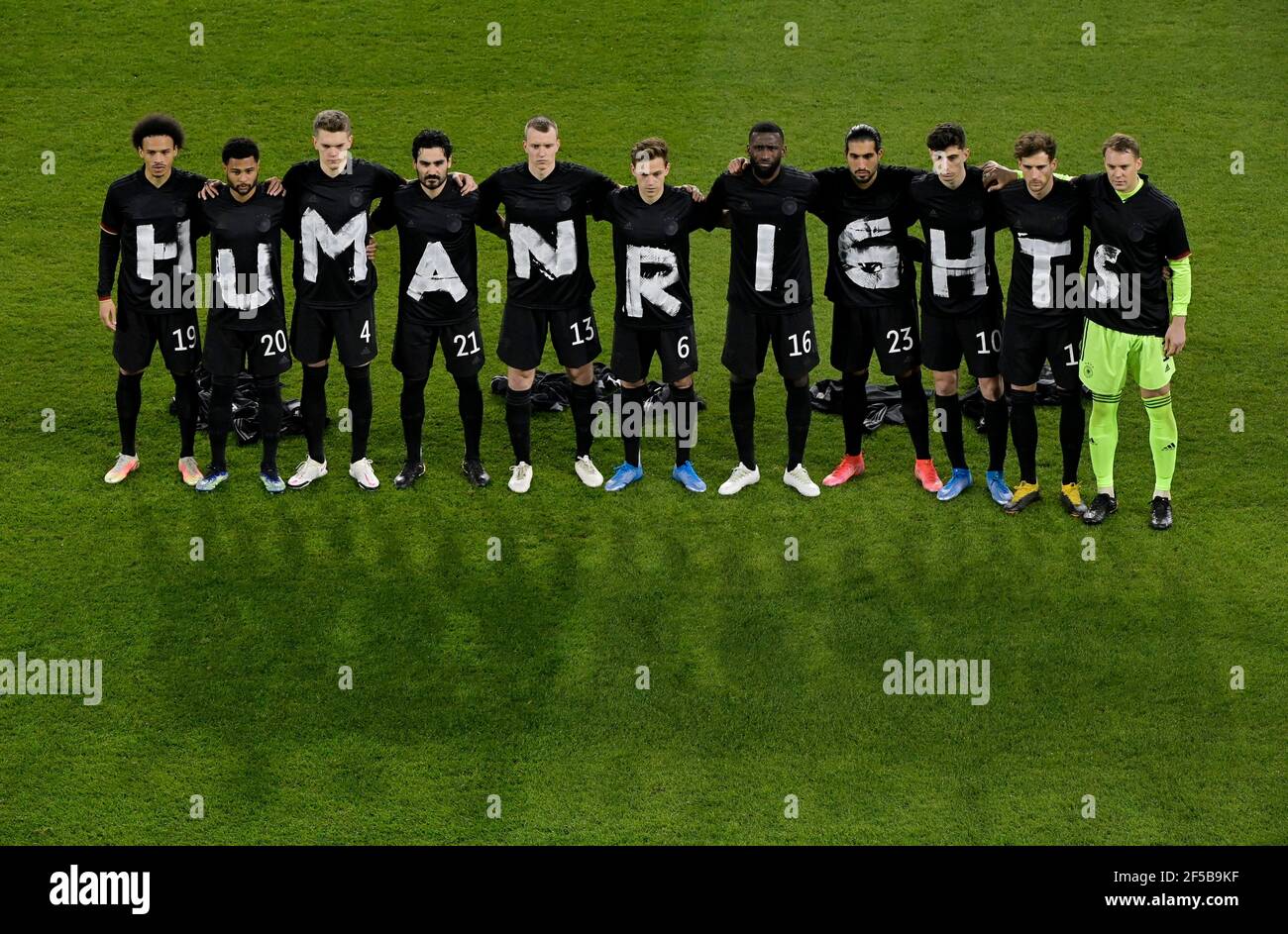 Soccer Football - World Cup Qualifiers Europe - Group J - Germany v Iceland - MSV-Arena, Duisburg, Germany - March 25, 2021 Germany players pose for a photo displaying a Human Rights message on their t-shirts before the match Pool via REUTERS/Tobias Schwarz Stock Photo