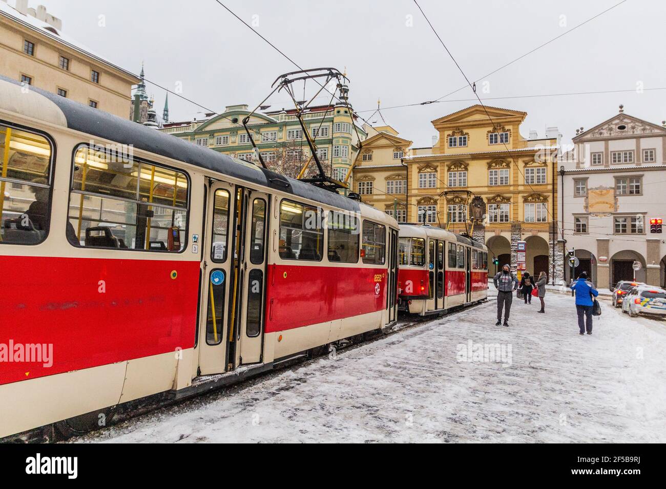 PRAGUE, CZECHIA - FEBRUARY 8, 2021: Tram stop at Malostranske namesti square in Prague, Czech Republic Stock Photo