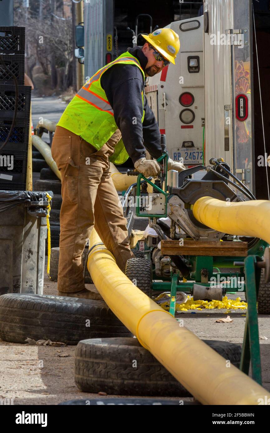 Detroit, Michigan - Workers for DTE Energy replace the original cast iron natural gas mains in the Morningside neighborhood. Stock Photo