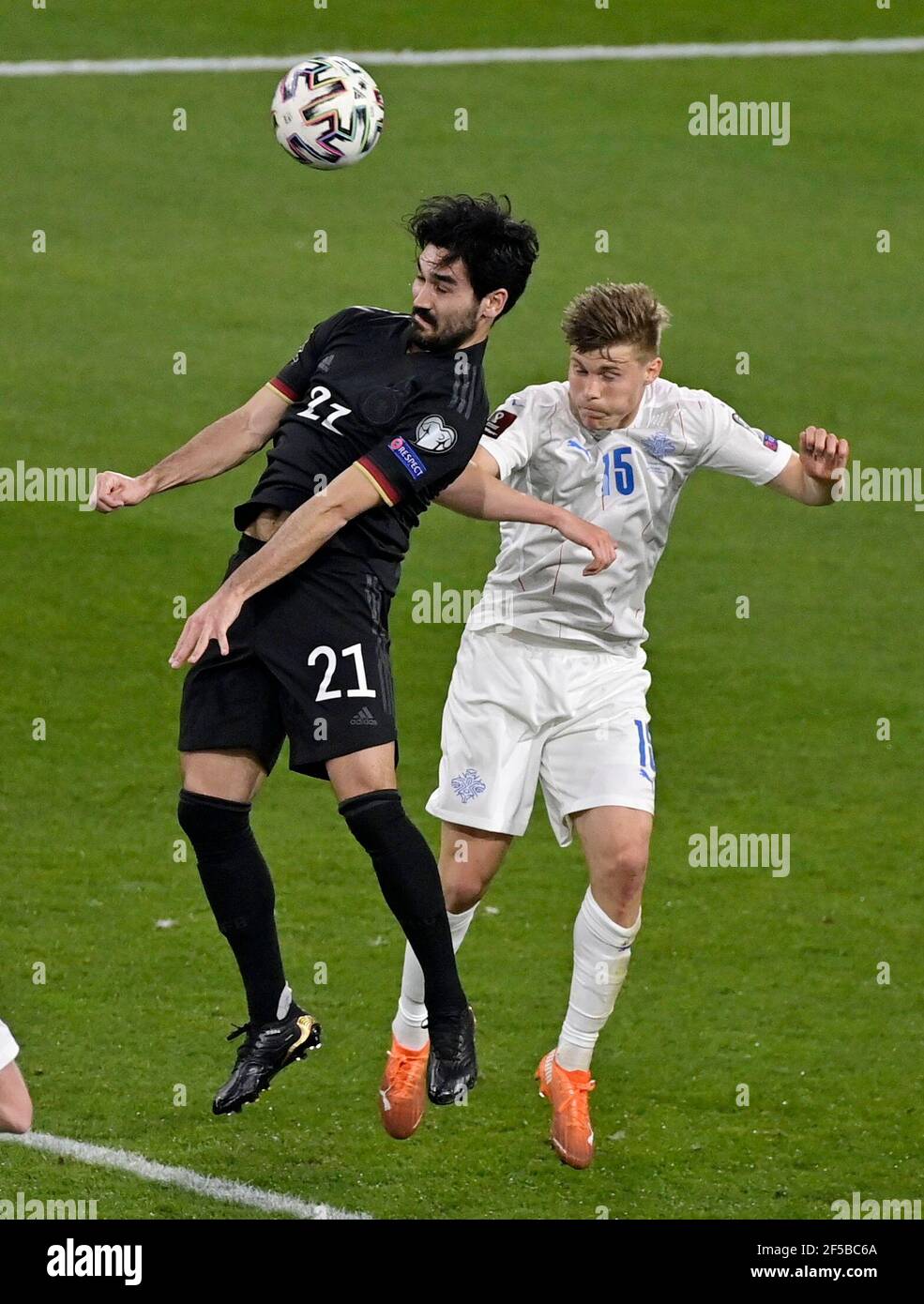 Soccer Football - World Cup Qualifiers Europe - Group J - Germany v Iceland - MSV-Arena, Duisburg, Germany - March 25, 2021 Germany's Ilkay Gundogan in action with Iceland's Alfons Sampsted REUTERS/Tobias Schwarz Stock Photo