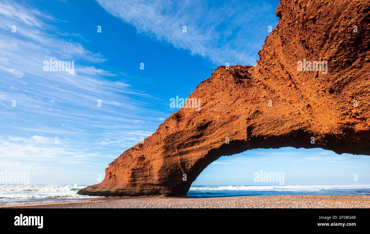 Natural phenomenon stone arch bridge of Legzira Beach, Atlantic ocean, Morocco Stock Photo