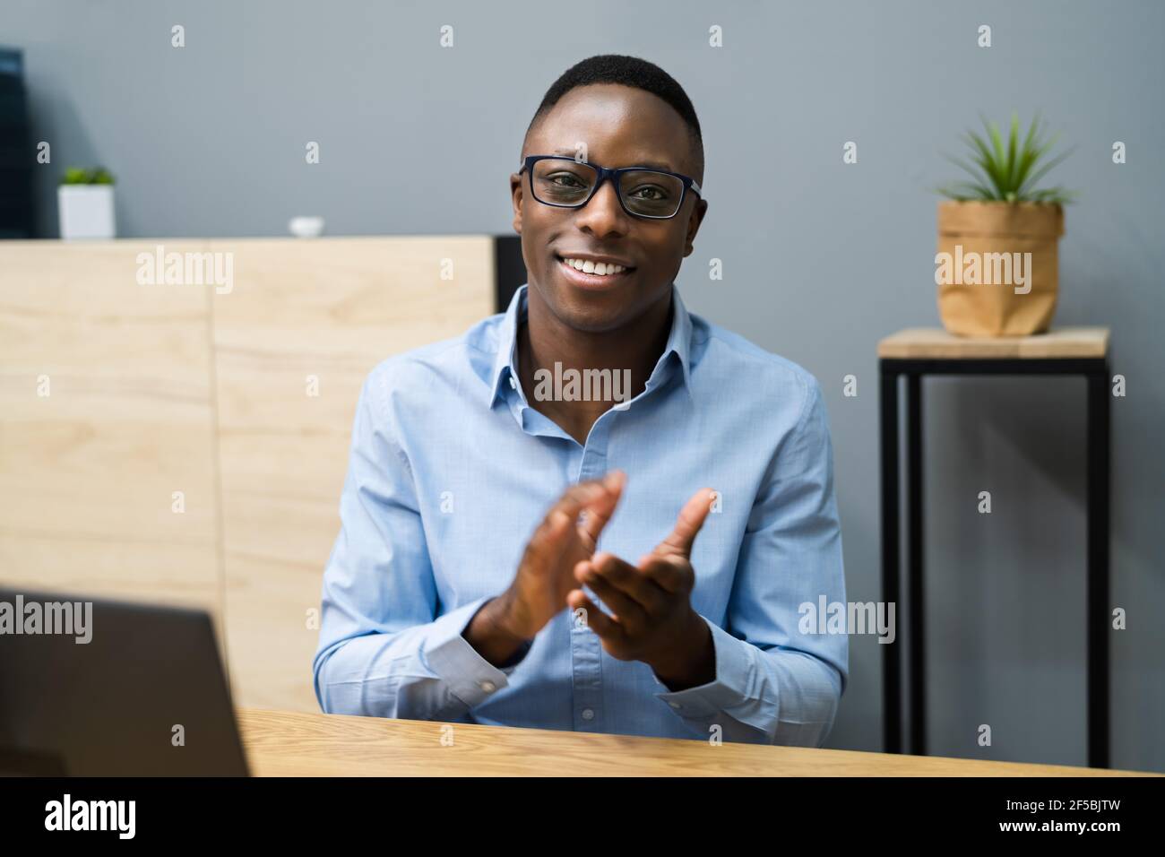 African American Black Man Applause And Clap In Virtual Remote Meeting Stock Photo