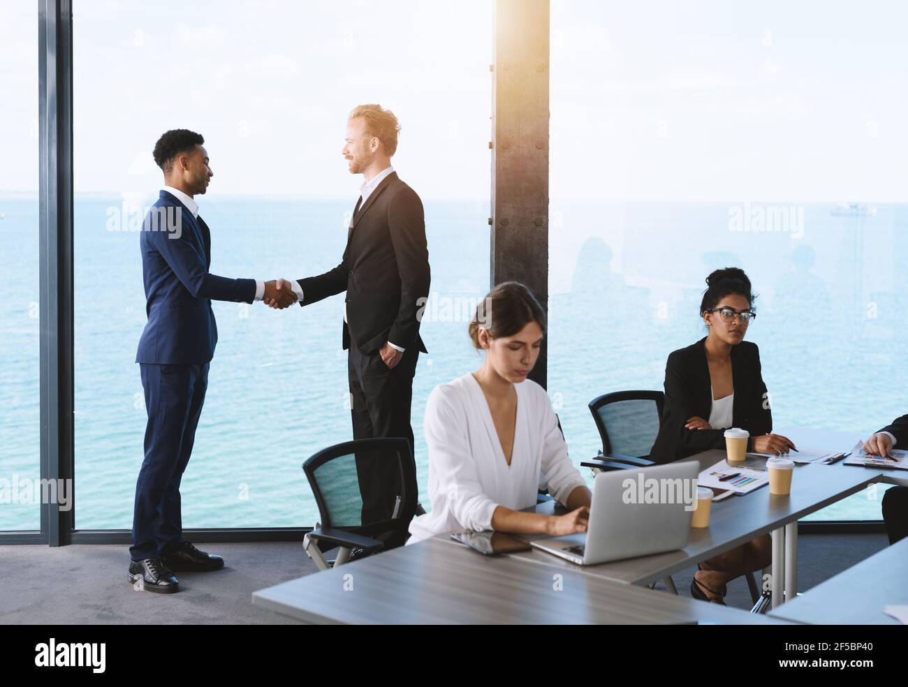 Business people that work together in office. Concept of teamwork and ...