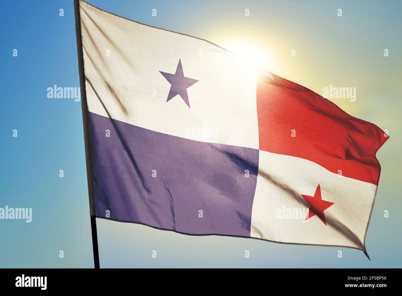 Panama flag waving on the wind in front of sun Stock Photo