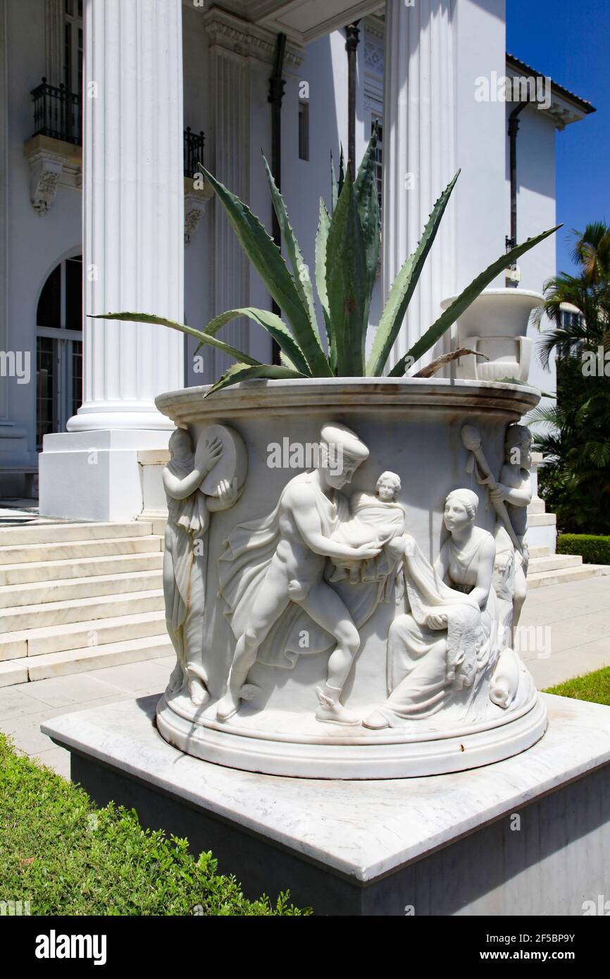 Flagler Museum, Palm Beach, Florida – the Façade of the house also known as Whitehall, large marble urn with Bacchanalian scenes Stock Photo