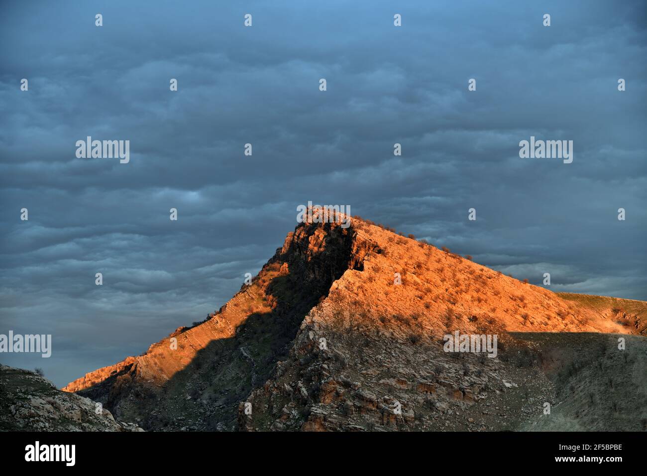 Safeen Mountain under Sunset Glow Stock Photo