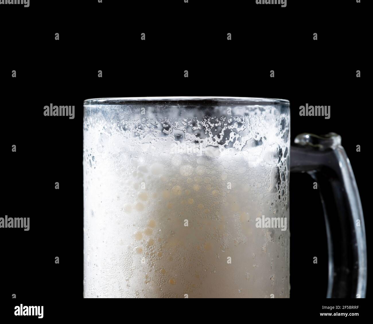 a mug of beer on a black background Stock Photo