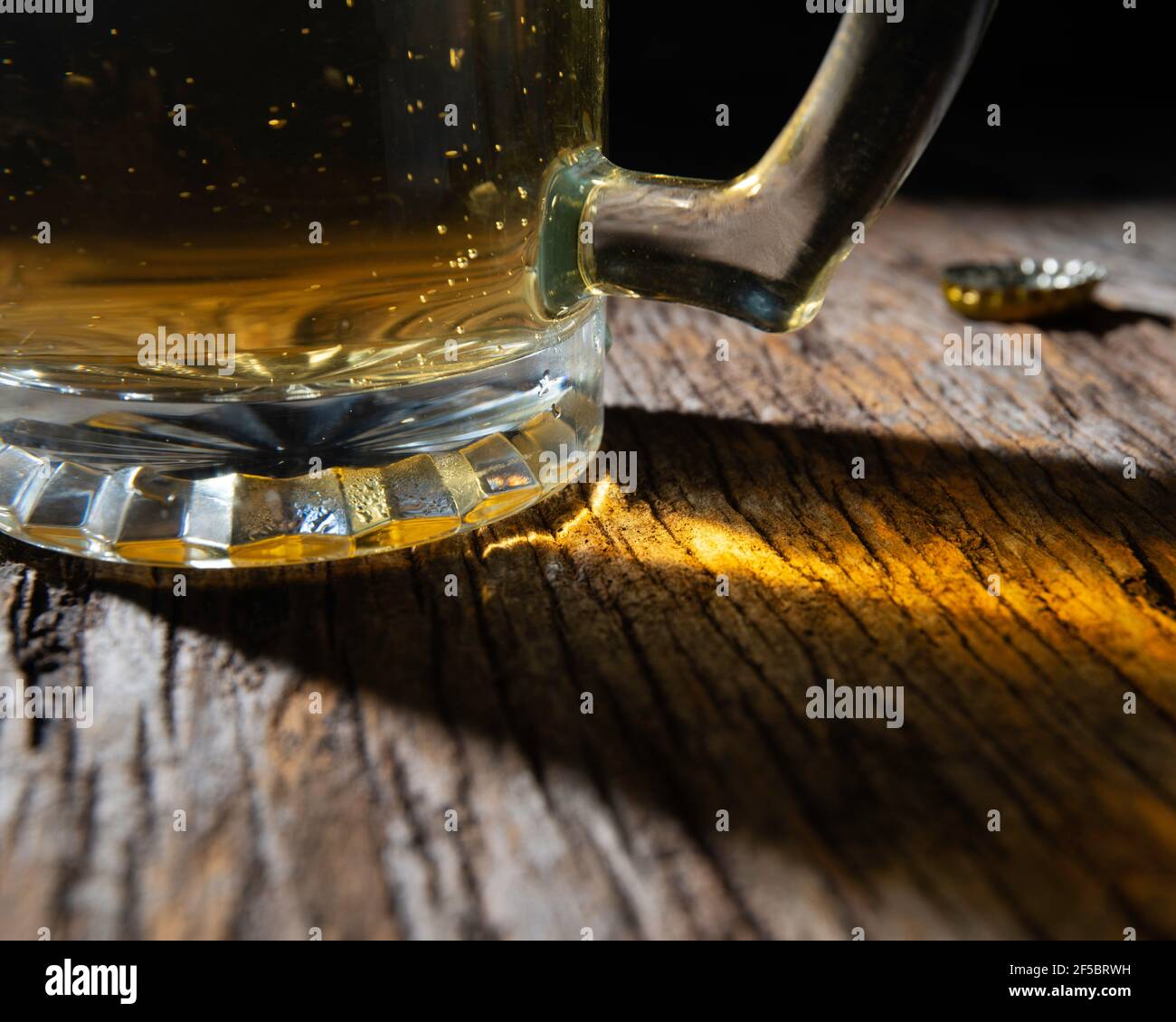 a mug of beer on a black background Stock Photo