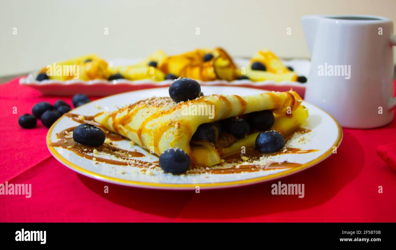 caramel, almond and blueberry crepes Stock Photo