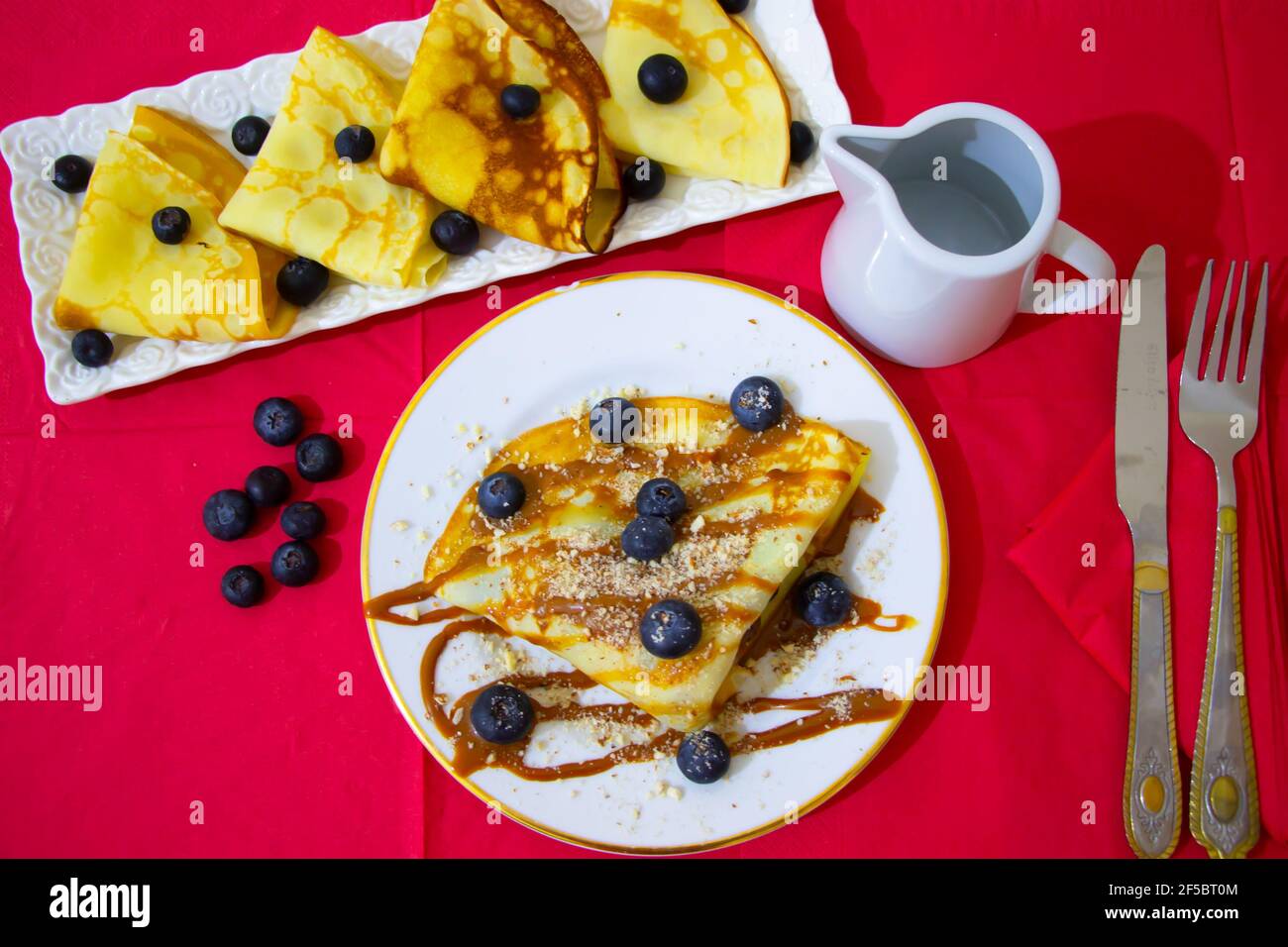 caramel, almond and blueberry crepes Stock Photo