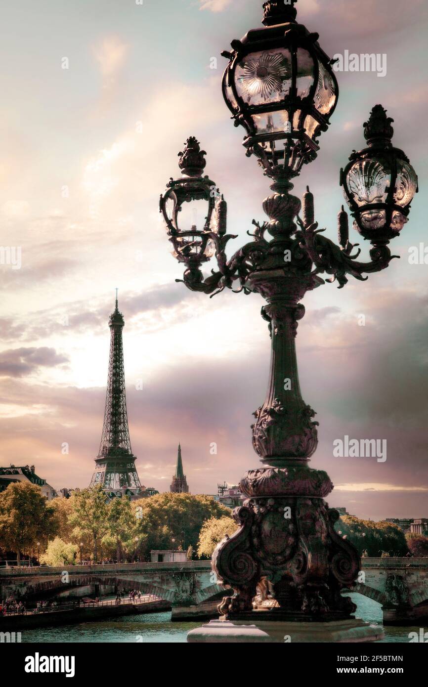 The Pont Alexandre III bridge with the Eiffel Tower rising in the background.  Paris, France. Stock Photo