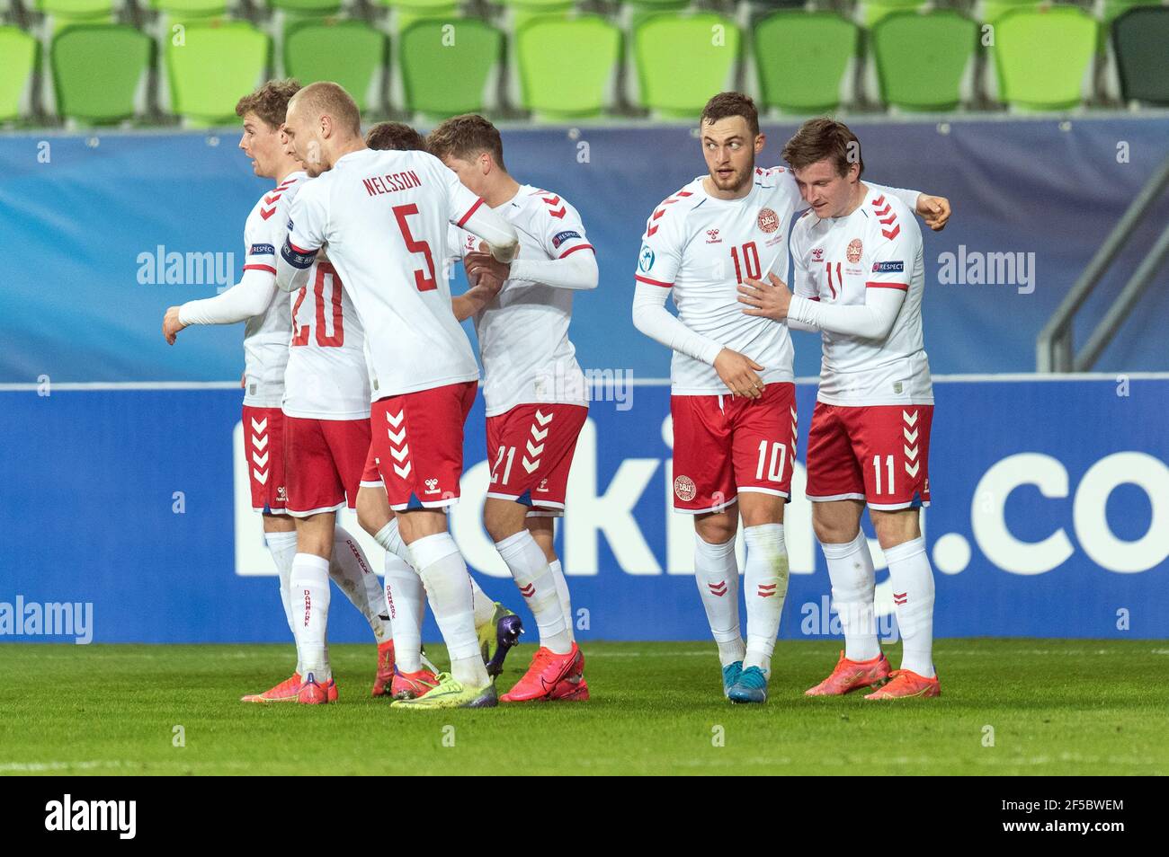 Szombathely, Hungary. 25th Mar, 2021. Anders Dreyer (11) of Denmark scores for 0-1 and celebrates with his team mates during the UEFA EURO U-21 match between France and Denmark at Haladas Stadium in Szombathely. (Photo Credit: Gonzales Photo/Alamy Live News Stock Photo