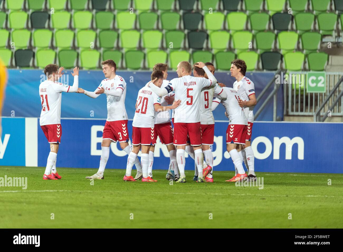 Szombathely, Hungary. 25th Mar, 2021. Anders Dreyer (11) of Denmark scores for 0-1 and celebrates with his team mates during the UEFA EURO U-21 match between France and Denmark at Haladas Stadium in Szombathely. (Photo Credit: Gonzales Photo/Alamy Live News Stock Photo