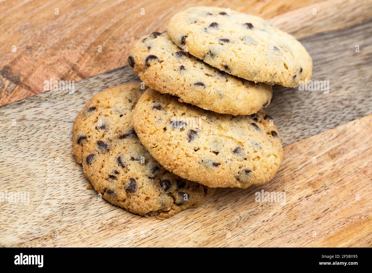 Fresh homemade chocolate chip cookie on wood table . Stock Photo