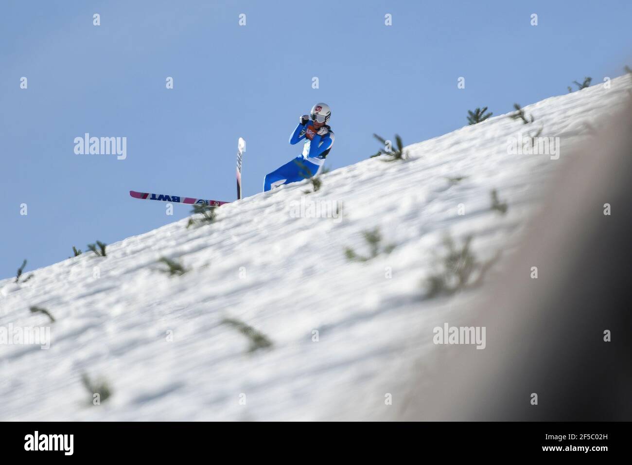Daniel Andre Tande of Norway crashes during the FIS Ski Jumping World Cup Flying Hill Individual competition in Planica. Stock Photo