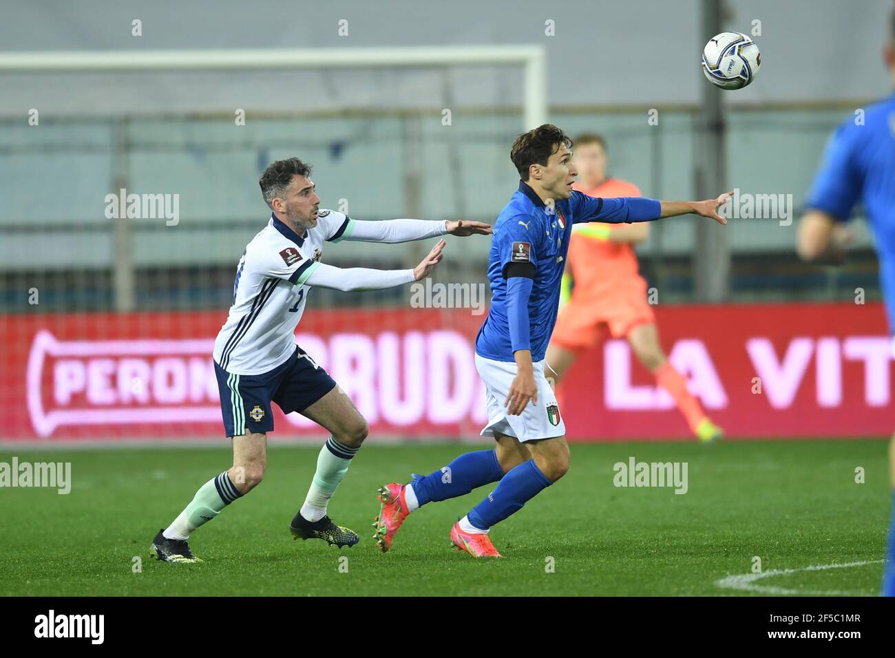 Parma, Italy. March 25 2021: Federico Chiesa (Italy)Michael Smith (Northern Ireland) during the Fifa 'World Cup Qatar 2022 qualifying' match between Italy 2-0 Northern Ireland at Ennio Tardini Stadium on March 25, 2021 in Parma, Italy. Credit: Maurizio Borsari/AFLO/Alamy Live News Stock Photo