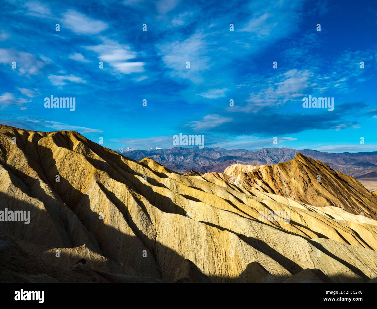 The stunning scenery of the badlands region near Zabriskie point in Death Valley National Park, California, USA Stock Photo