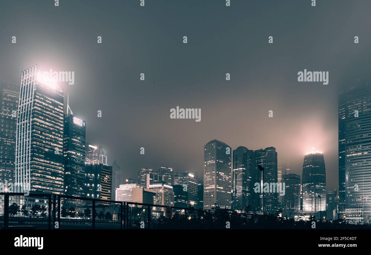 Modern office buildings in Hong Kong at night time Stock Photo - Alamy
