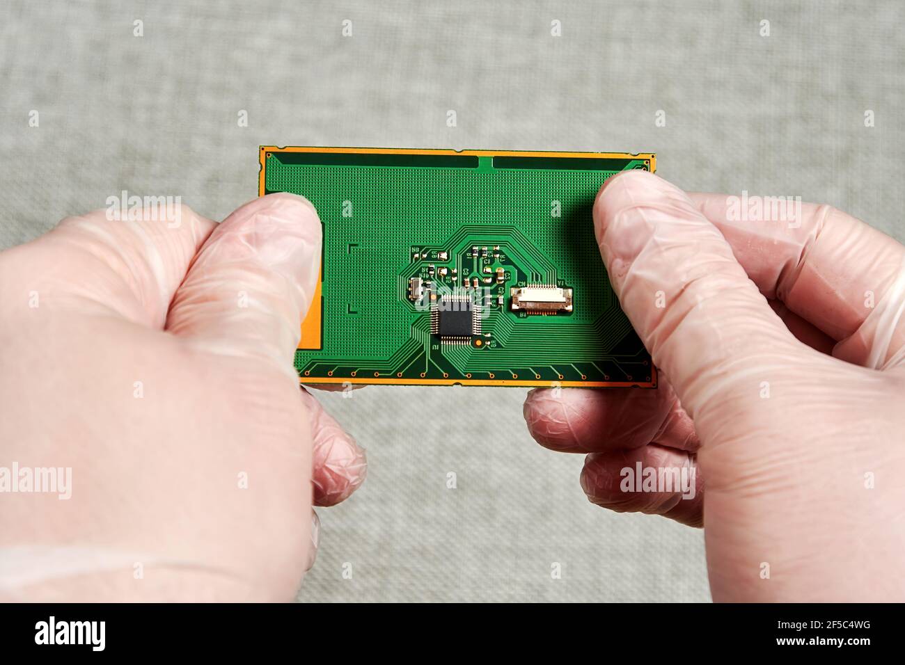 Engineer working with PCB and microchip in the laboratory. Nanotechnology and manufacture laboratory Stock Photo