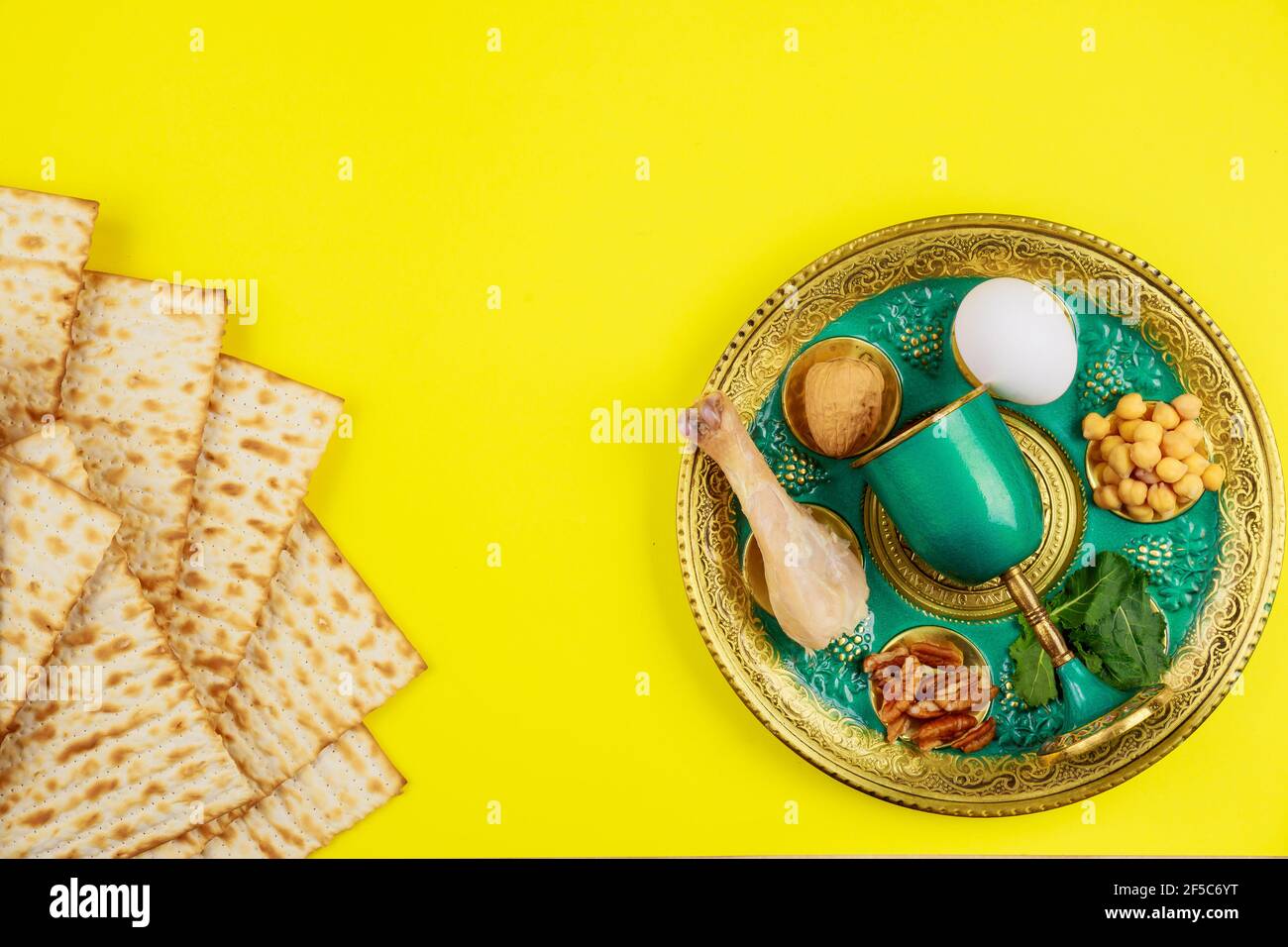 Jewish matzah, kiddush and seder with egg, bone, herbs, walnut. Passover concept Stock Photo Alamy