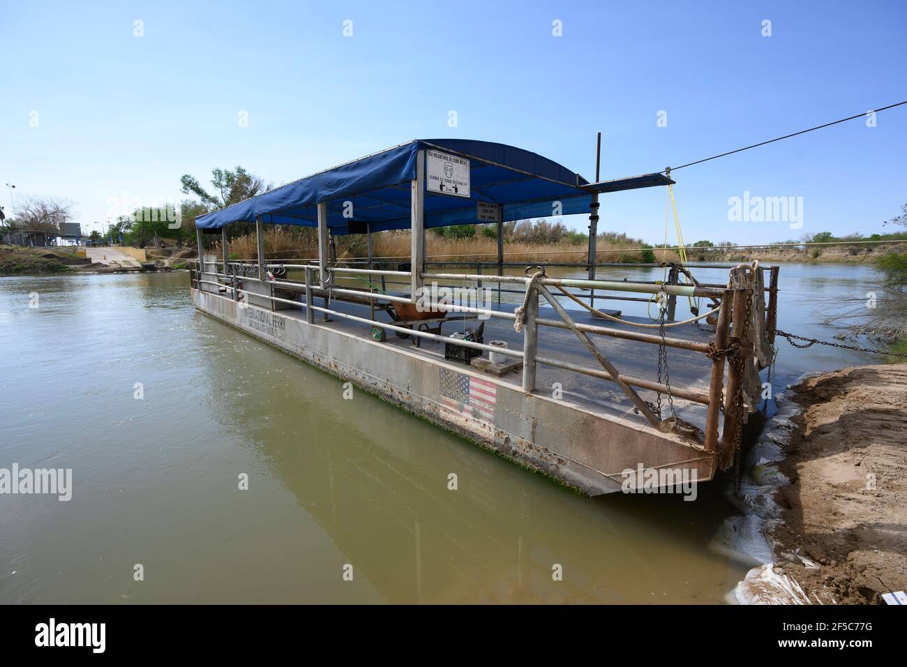 Los Ebanos, Texas, USA. 25th Mar, 2021. The handdrawn ferry on the Rio