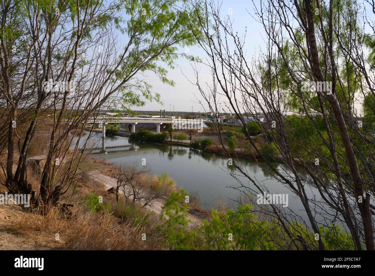 https://c8.alamy.com/comp/2F5C7A7/roma-texas-usa-25th-mar-2021-the-international-bridge-between-roma-texas-and-ciudad-miguel-aleman-in-mexico-spans-the-relatively-calm-rio-grande-on-march-25-2021-the-area-is-regularly-patrolled-by-several-agencies-due-to-its-easy-access-to-the-river-in-starr-county-texas-credit-bob-daemmrichzuma-wirealamy-live-news-2F5C7A7.jpg