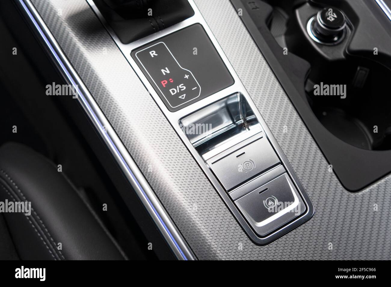 Detail of a parking brake in a nodern car. Electronic parking brake