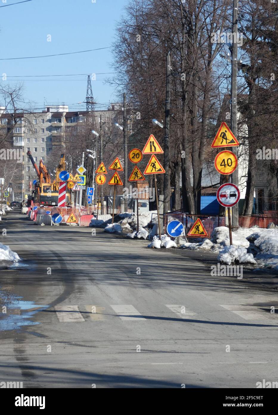 Under construction - Road signs along street Stock Photo - Alamy