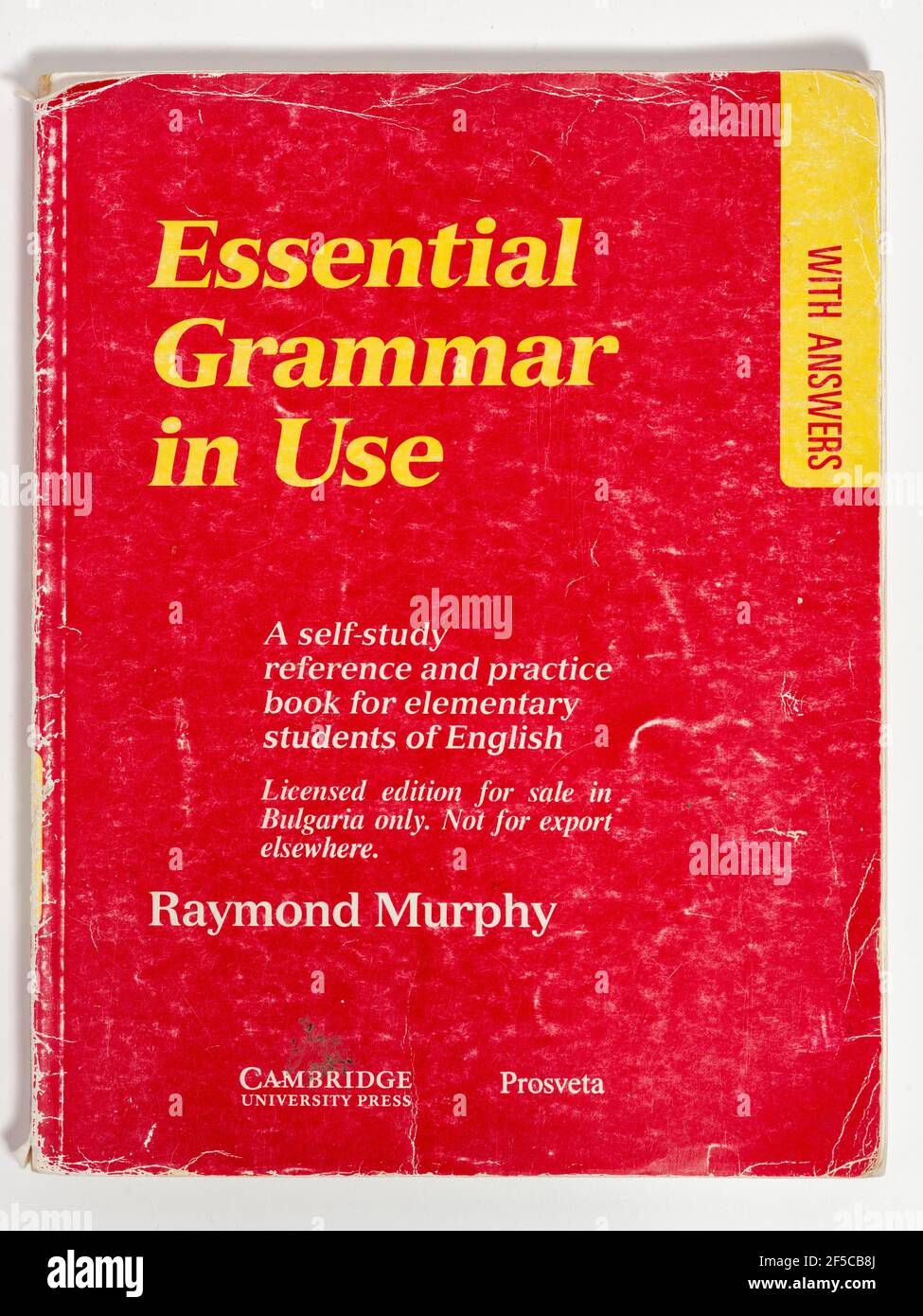 Essential Grammar in Use by Raymond Murphy paperback book cover showing wear, Cambridge University Press 1990, Issued for Bulgaria. Stock Photo