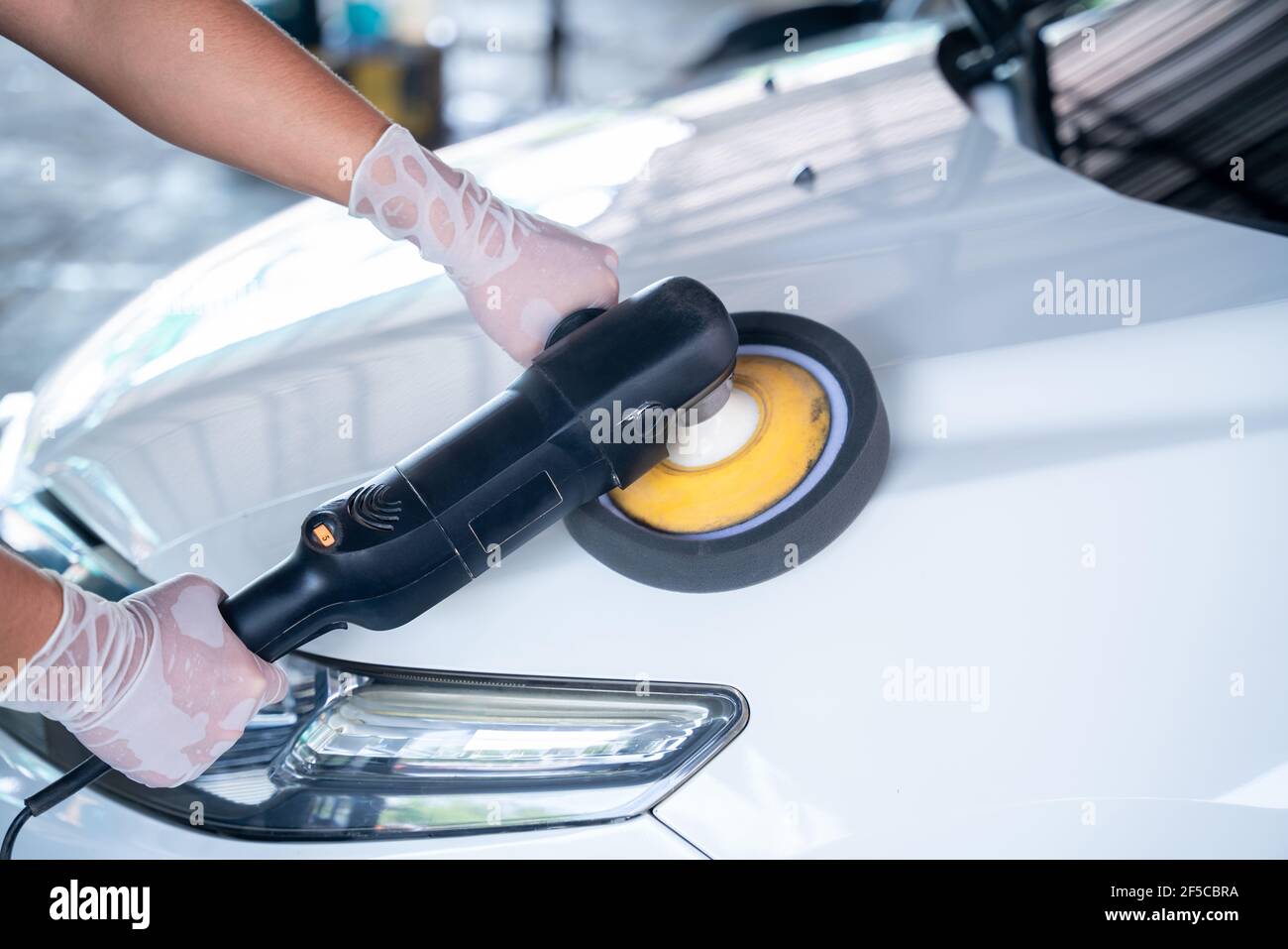 Close up of white car is polishing in the garage, Car wash service concept Stock Photo Alamy