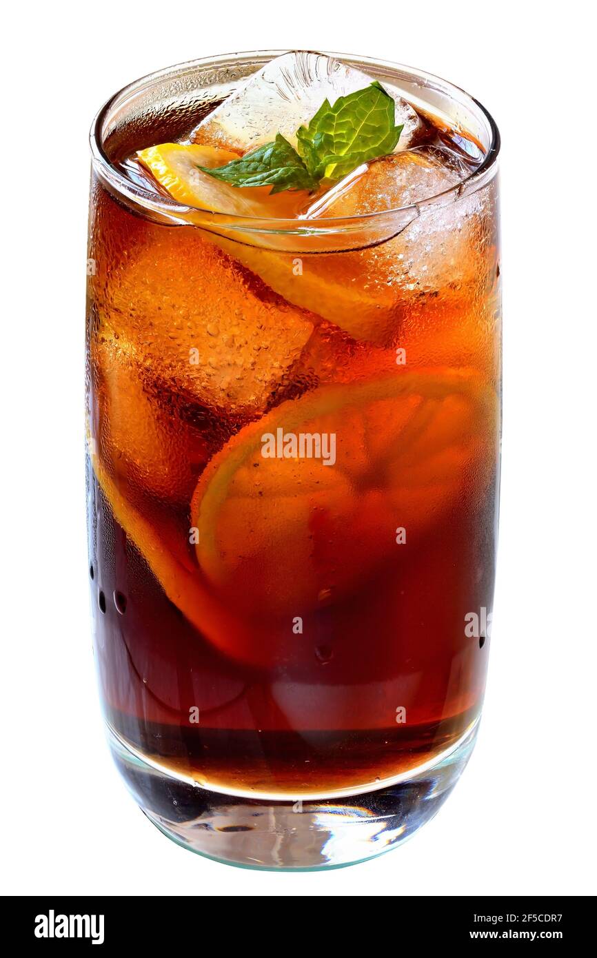 Cola drink with ice cubes and sliced lemon in a highball glass on a ...
