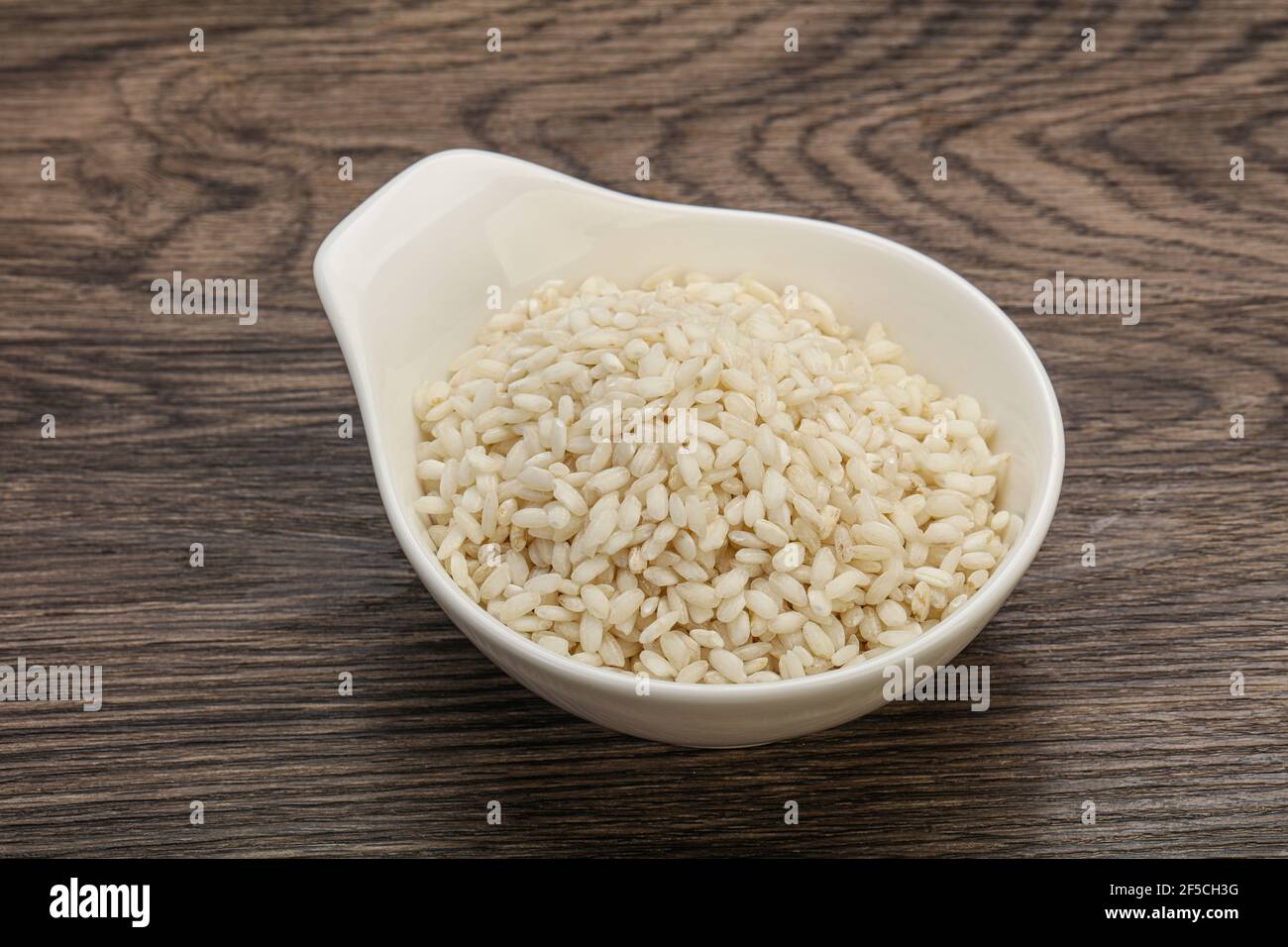 Raw Italian arborio rice for Risotto Stock Photo Alamy