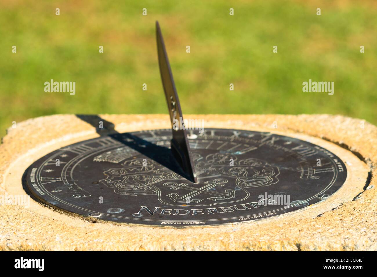sundial with the name Nederburg engraved on it at the wine estate in Cape Winelands, South Africa Stock Photo