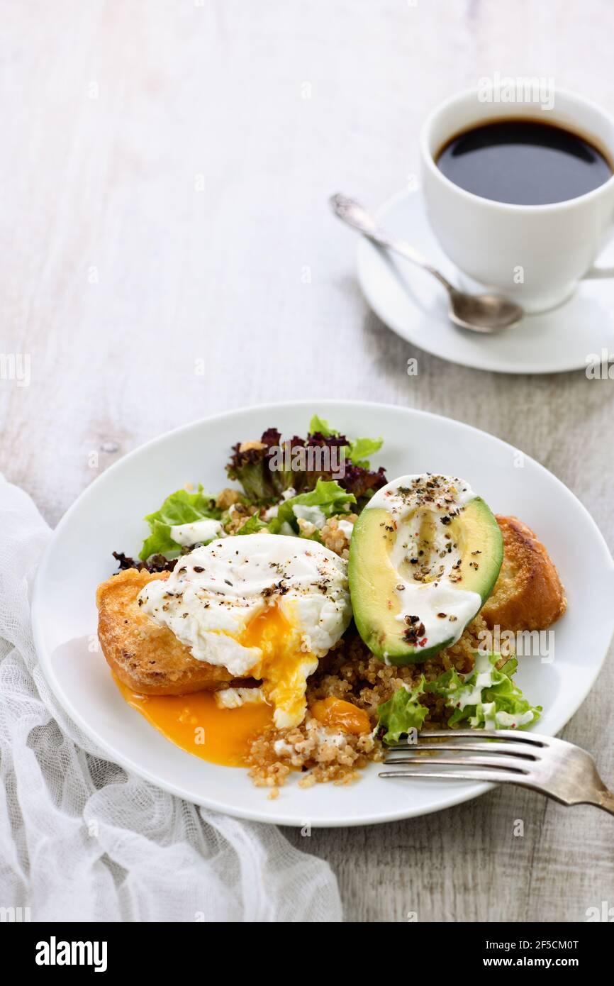 A healthy and balanced breakfast plate. Benedict's egg spreads on a