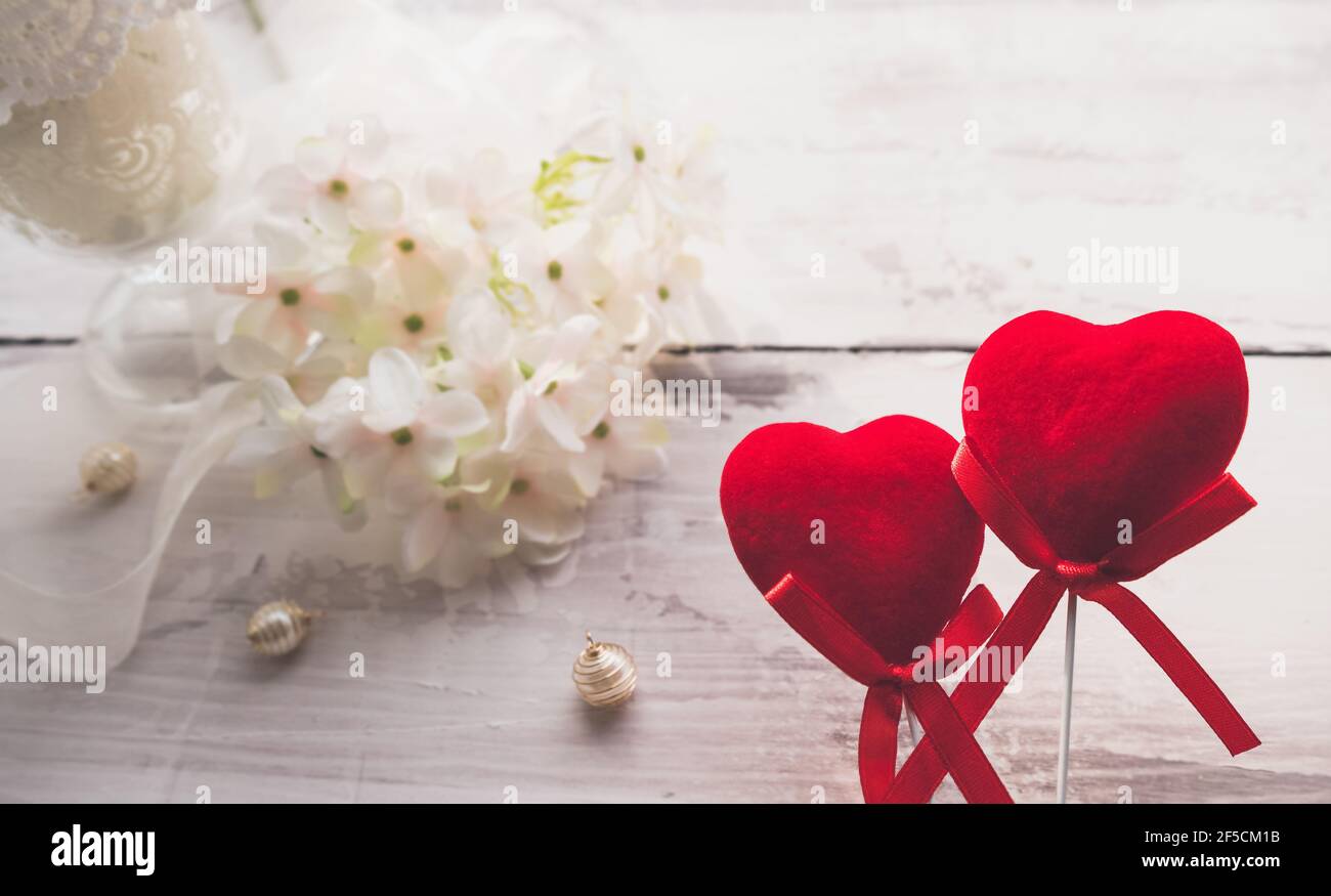 wedding or couple anniversary celebration background with red hearts  flowers and decor Stock Photo - Alamy, image size:1300x875