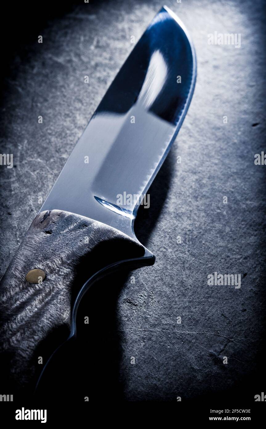 hunter knife, mysterious menacing weapon Stock Photo