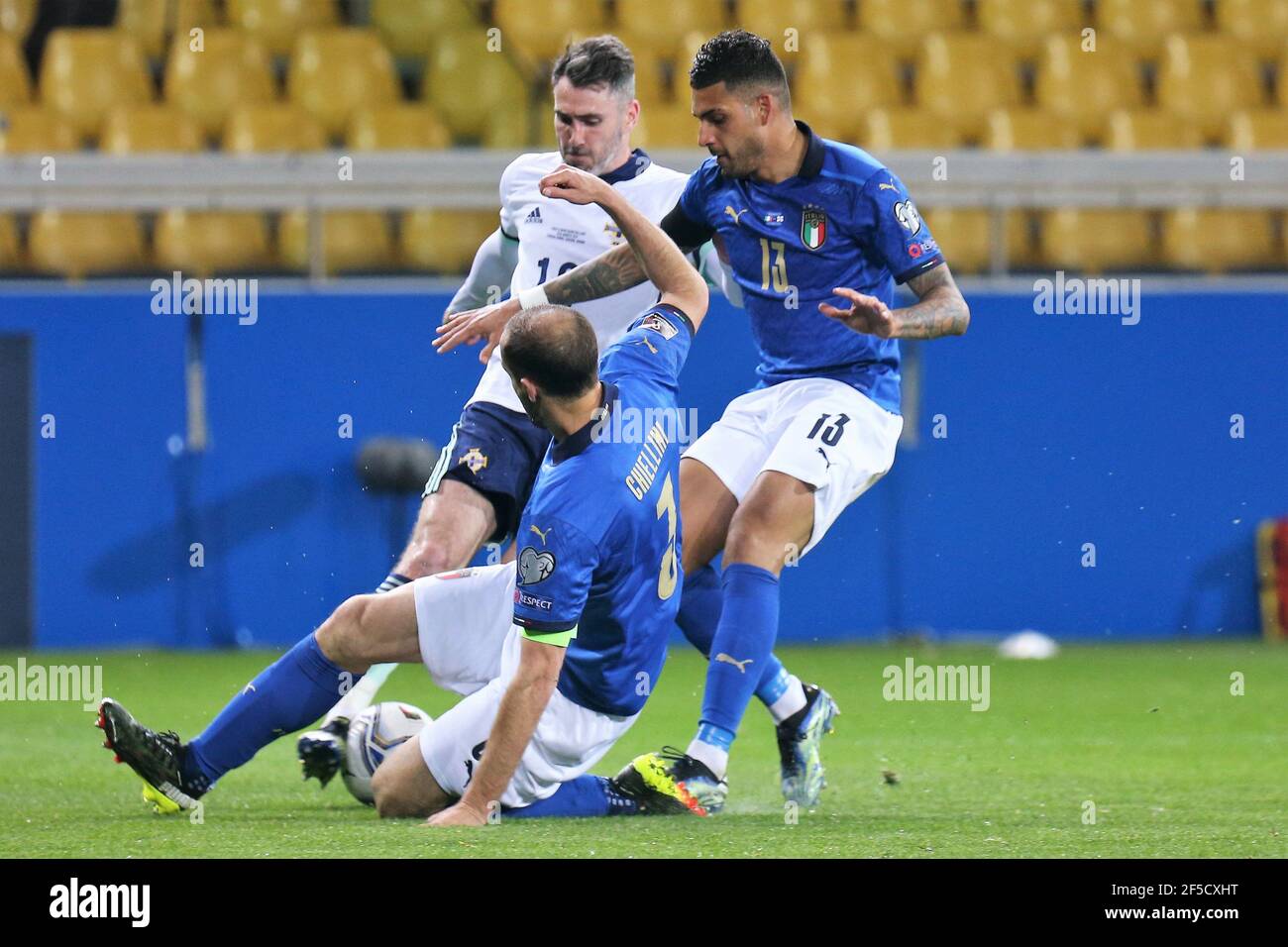 Michael Smith of Northern Ireland and Giorgio Chiellini, Emerson of Italy during the FIFA World Cup 2022, Qualifiers Group C football match between Italy and Northern Ireland on March 25, 2021 at Ennio Tardini stadium in Parma, Italy - Photo Laurent Lairys / DPPI / LiveMedia Stock Photo