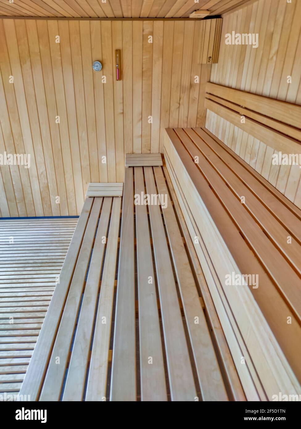 Interior of the empty new wooden sauna Stock Photo