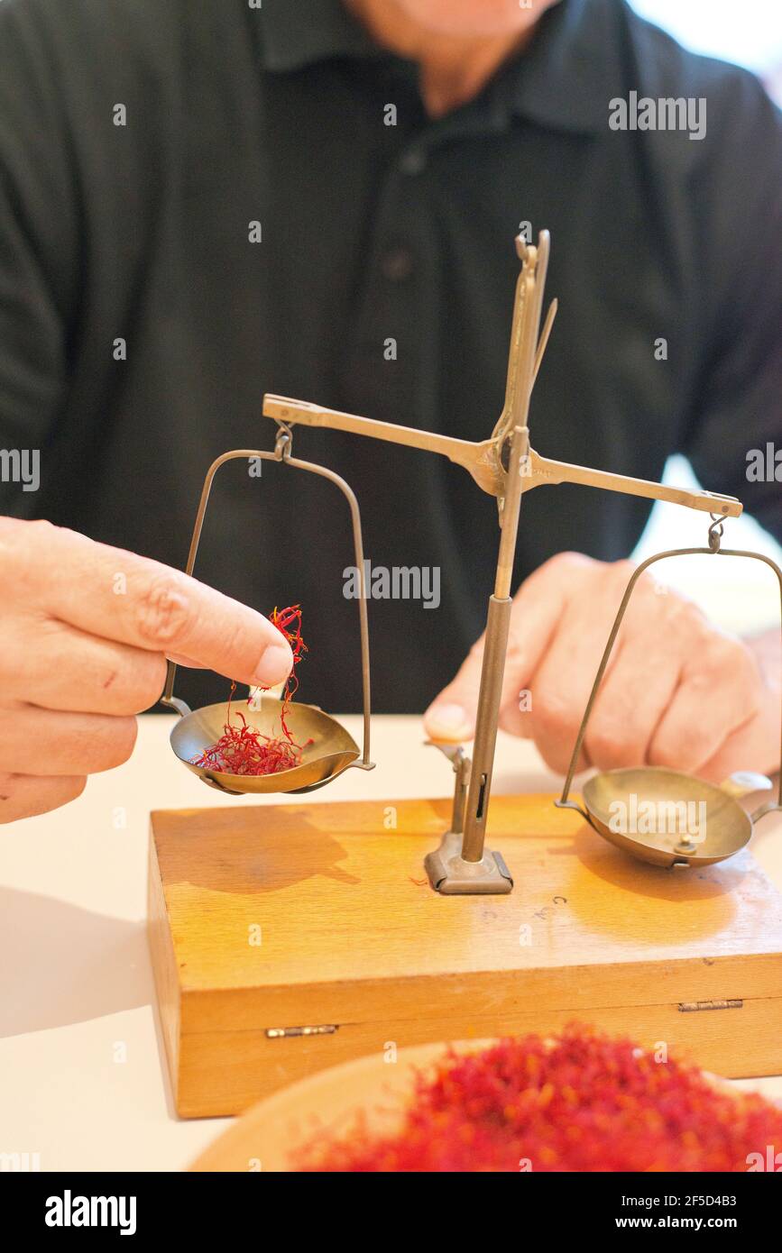 saffron weighing with traditional slingbar Stock Photo