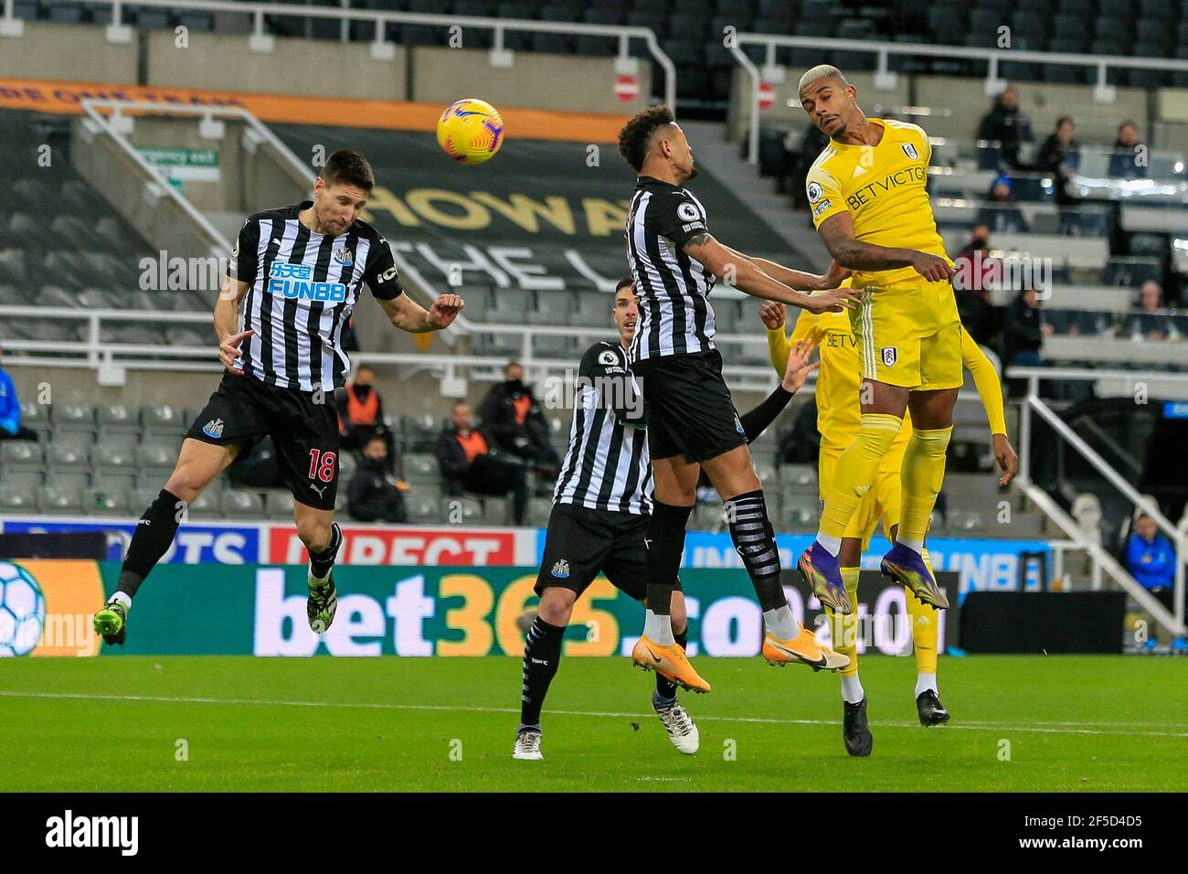 Federico Fernández #18 of Newcastle United heads the ball Stock Photo