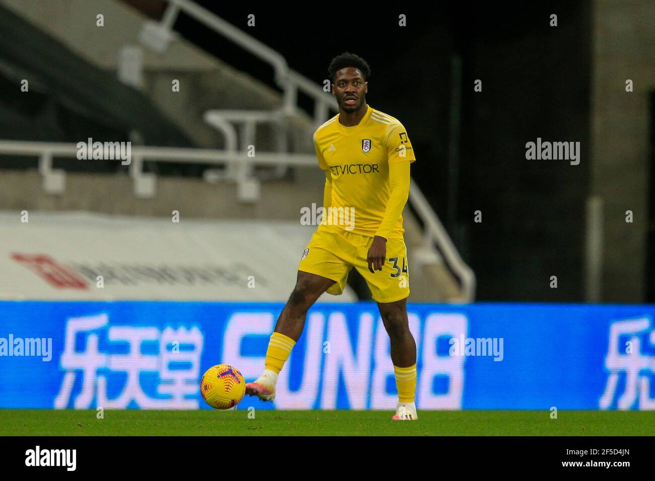 Ola Aina #34 of Fulham with the ball Stock Photo