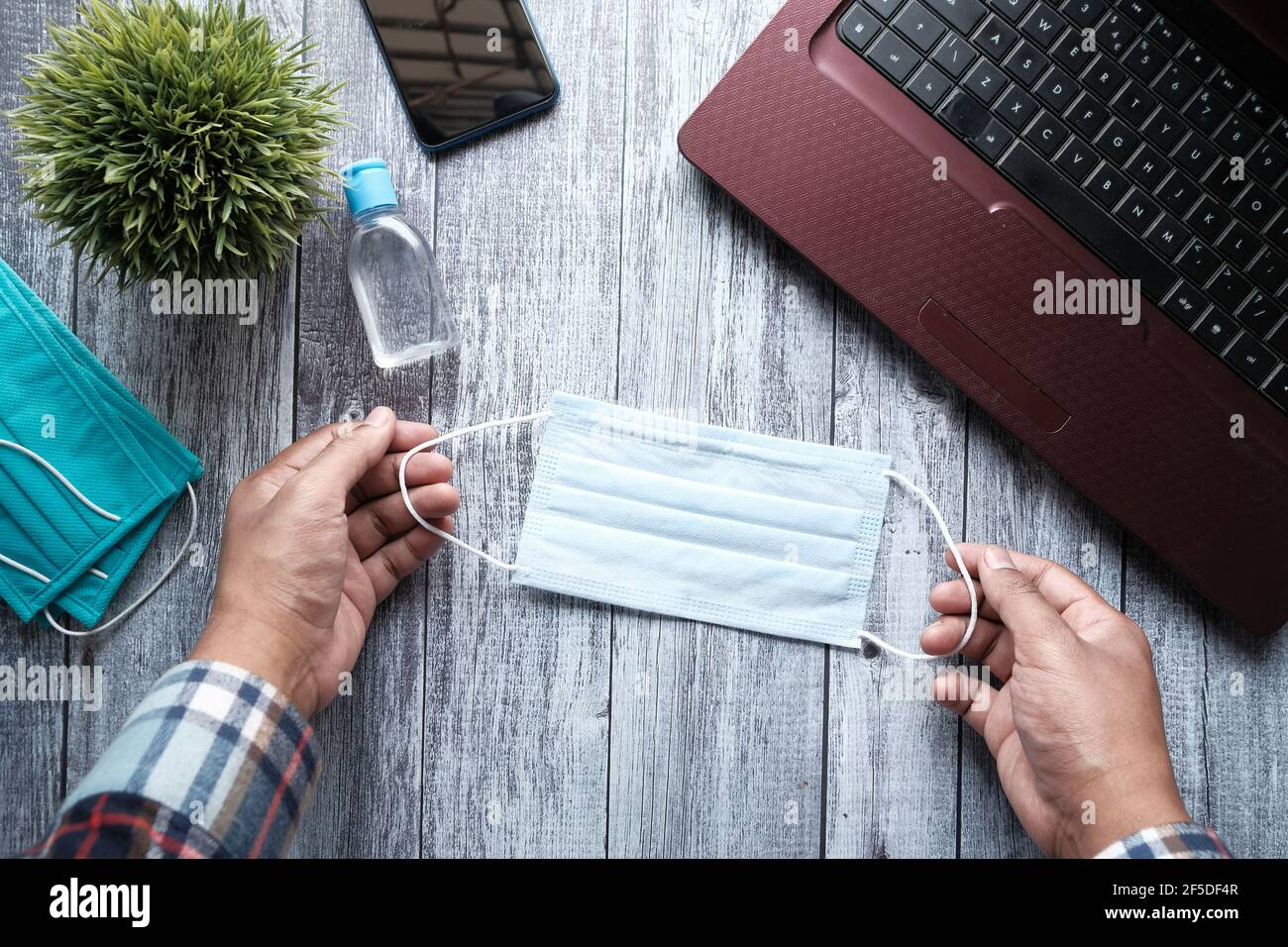 Top view blue surgical masks hi-res stock photography and images - Alamy