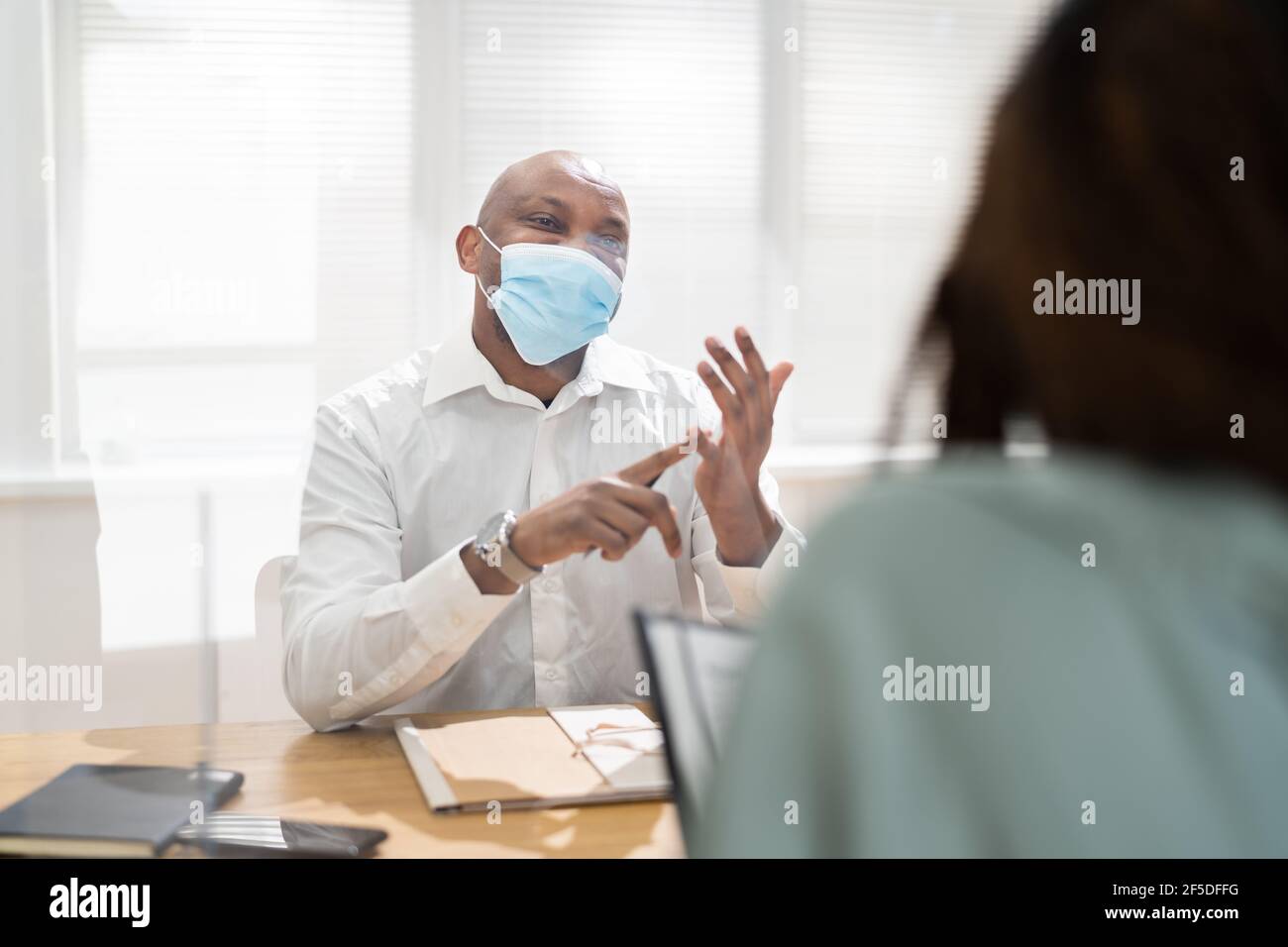 Job Interview Business Meeting At Law Office Wearing Face Mask Stock
