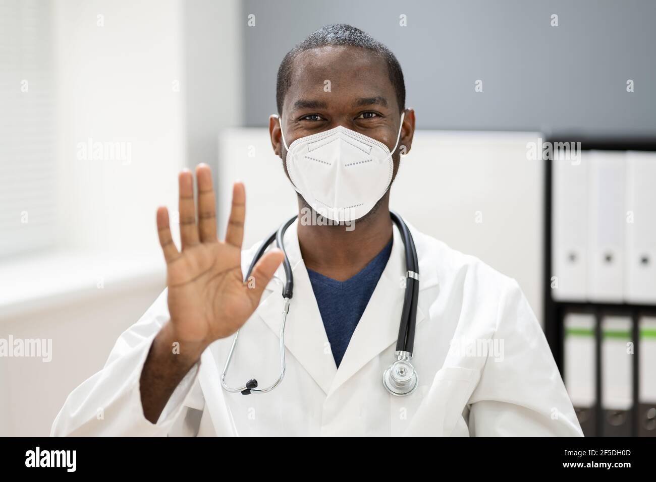 African American Man Doctor Wearing Medical Mask In Hospital Stock