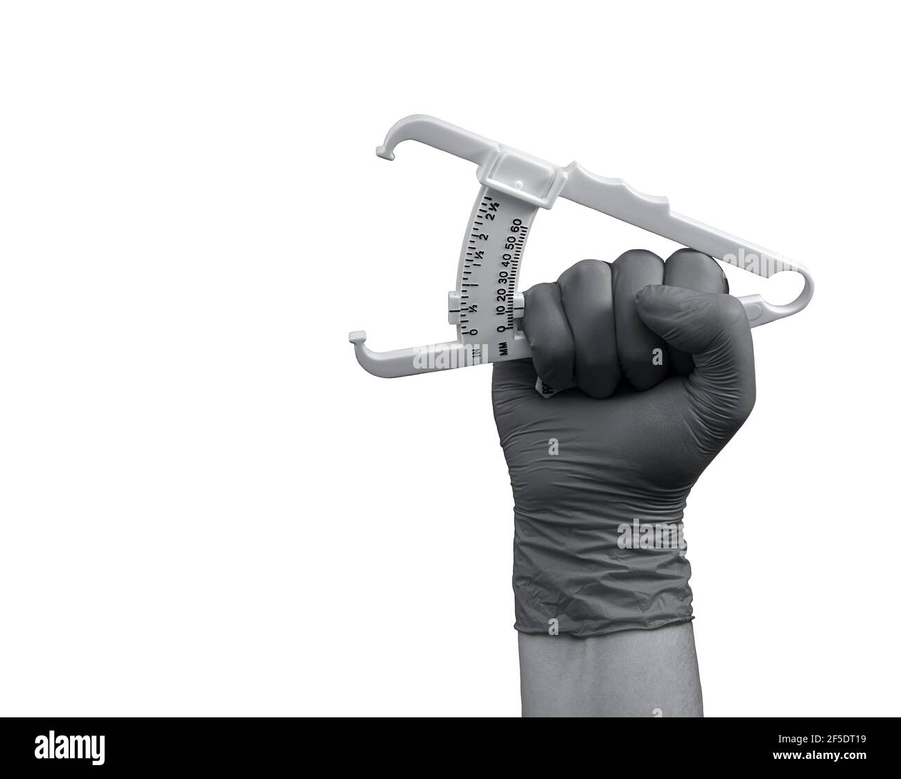 A caliper for measuring subcutaneous fat, in the hand compressed into a fist in a rubber glove, isolated on a white background, in gray. Stock Photo