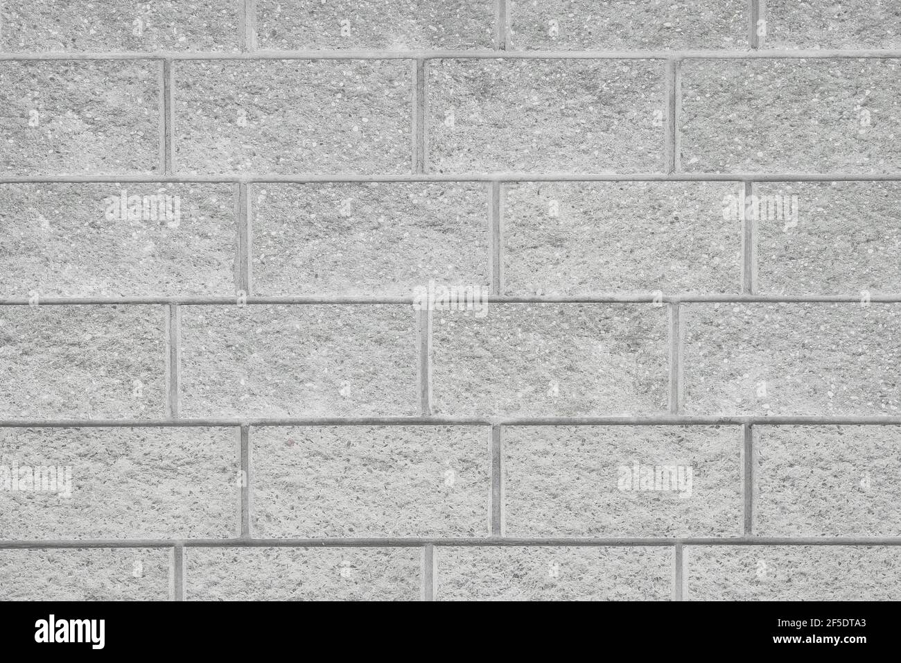 Gray abstract block masonry, brick wall texture, background. Stock Photo