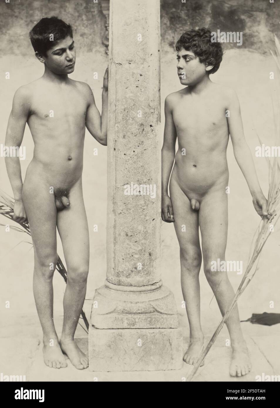 Two boys with column. Baron Wilhelm von Gloeden (German, 1856 - 1931) Stock Photo