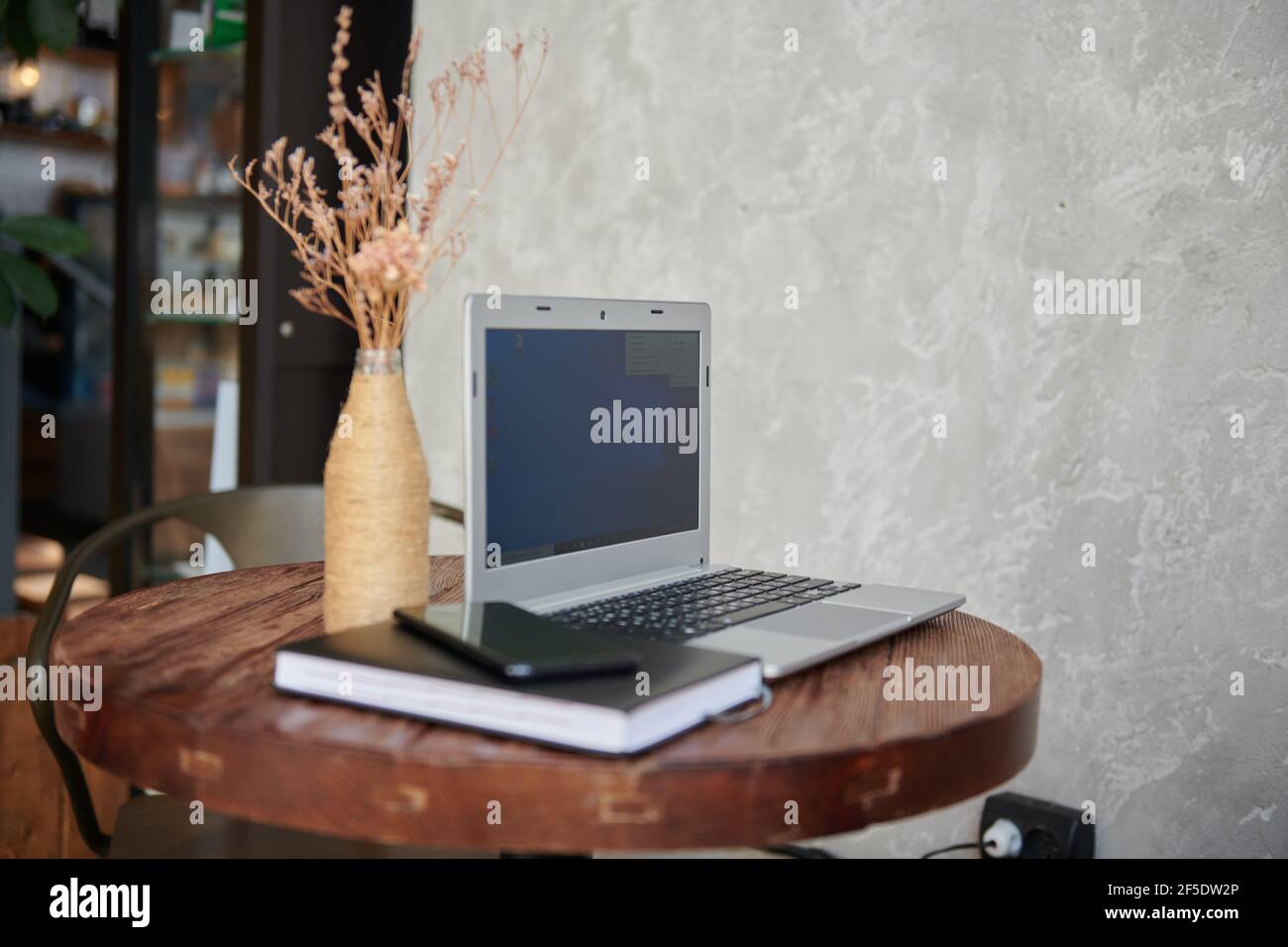 laptop phone note book lie on the table Stock Photo